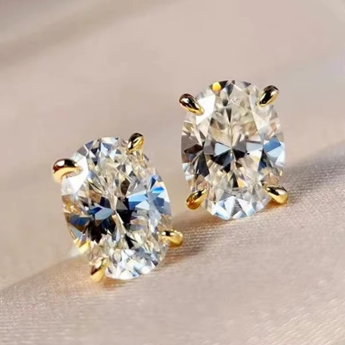 Oval Stud Earrings with Solitaire Zirconia – Gold Plated