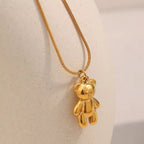 Collana dorata con ciondolo orsetto e catena sottile a maglie