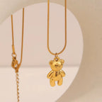 Collana con ciondolo orsetto dorato e catena sottile a maglie